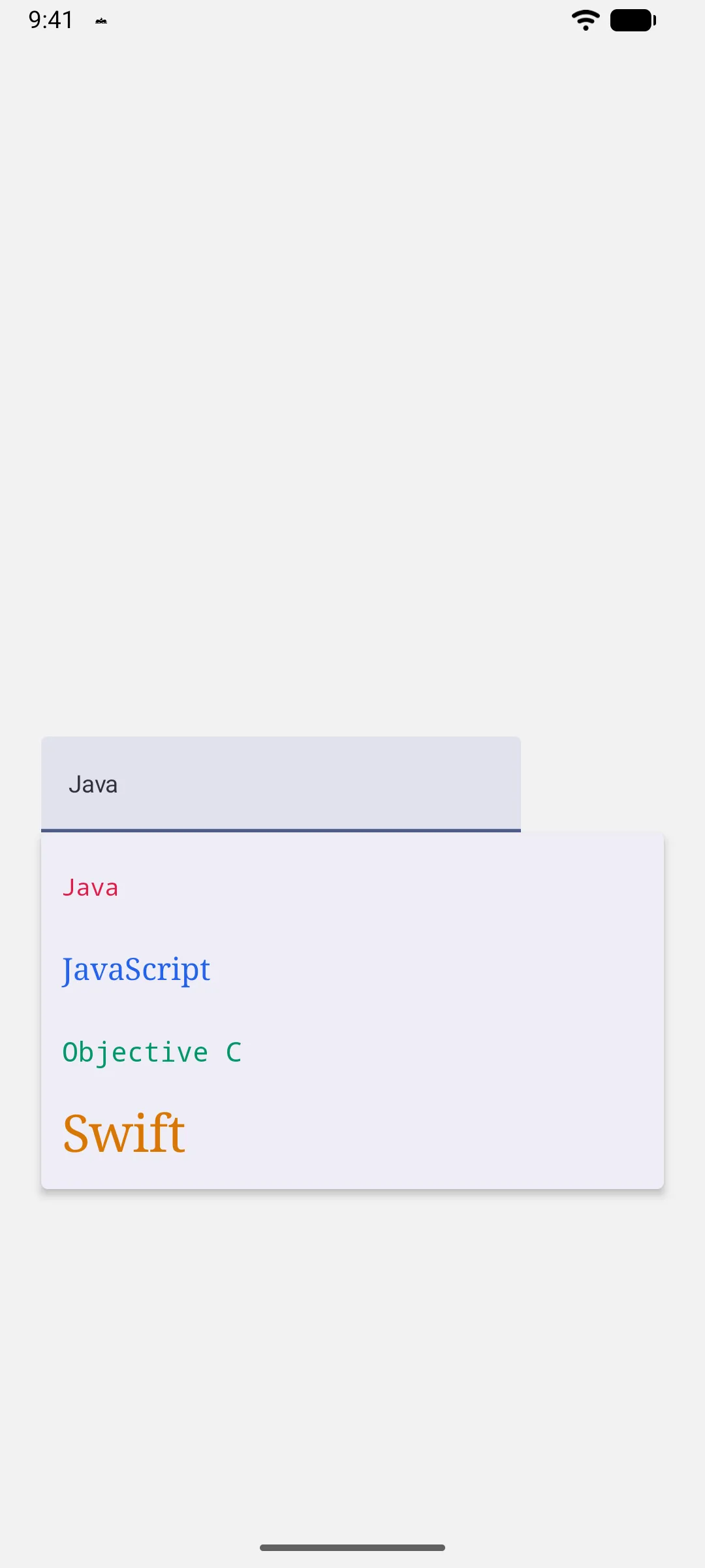 An open dropdown with each language in its own color and font