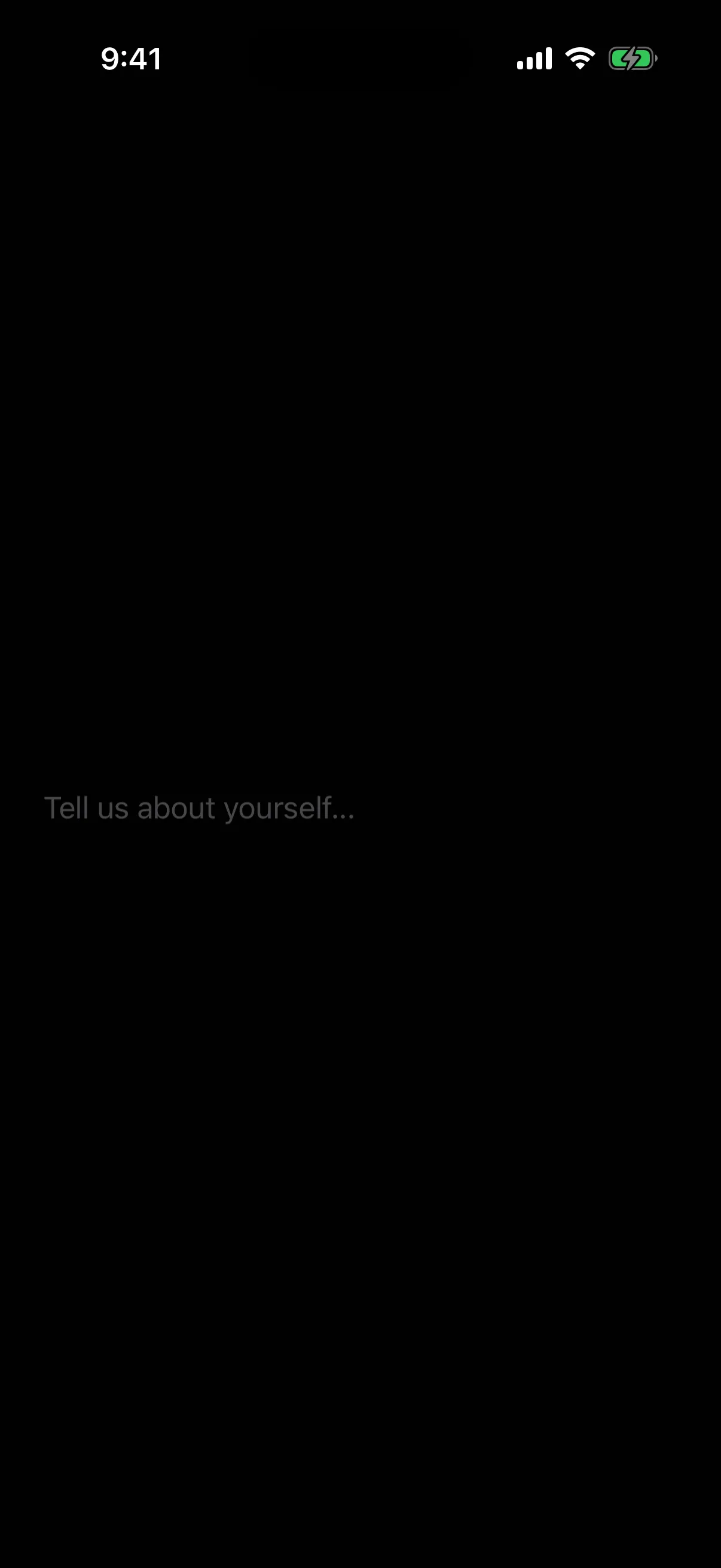 An empty multiline text field showing the placeholder Tell us about yourself