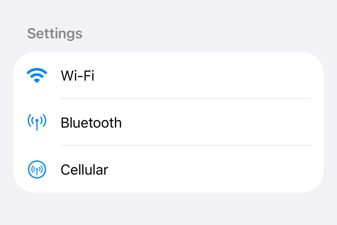 A List with Favorites and Recents sections, each row showing a colored SF Symbol icon and a label